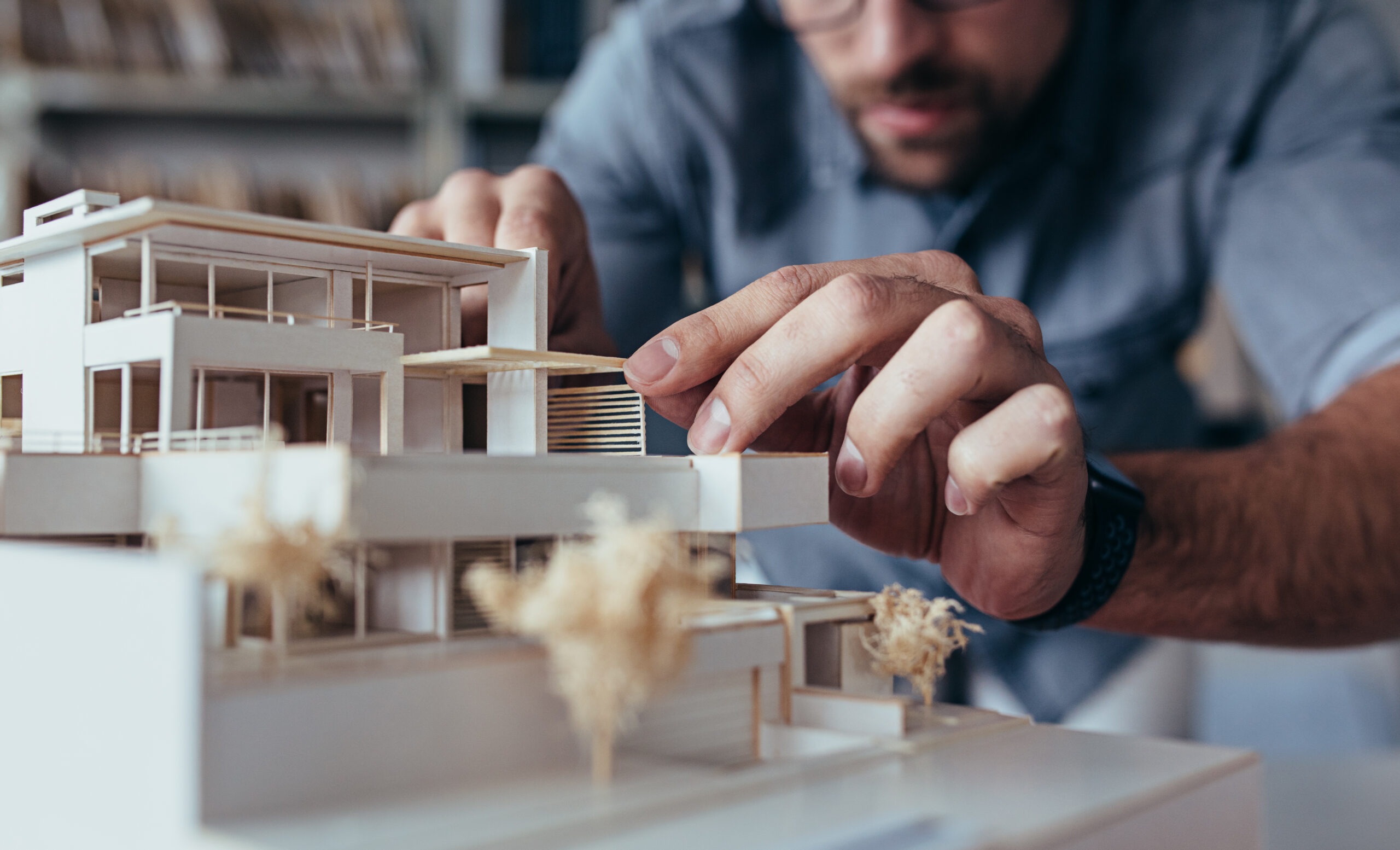 Male Architect Hands Making Model House