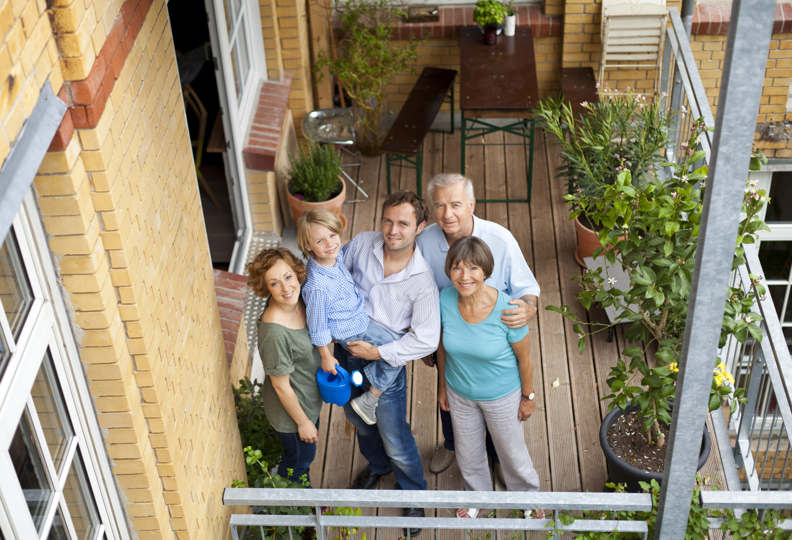 three generation family on balcony